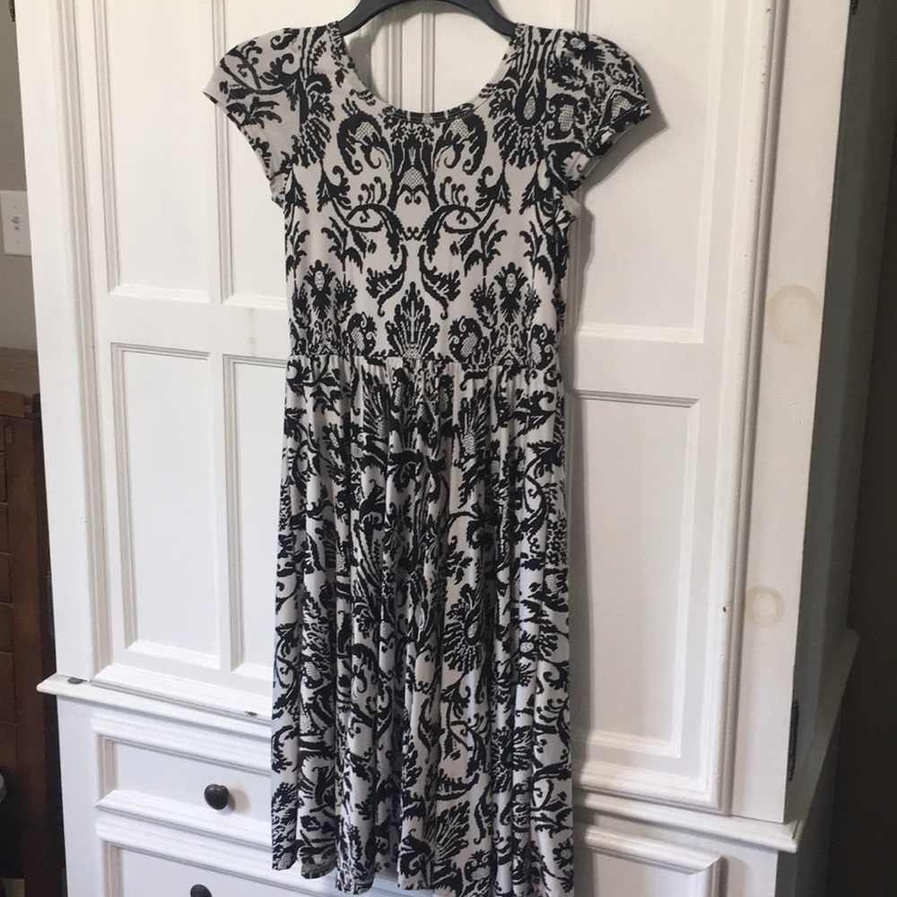 Lularoe EUC girls dot dot smile size 12/14